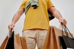 Image of person holding shopping bags